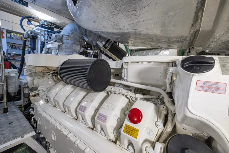 Slide: The Image of Engine room of 2020 Sunseeker Predator 74 yacht, featuring a powerful MAN engine. - 29