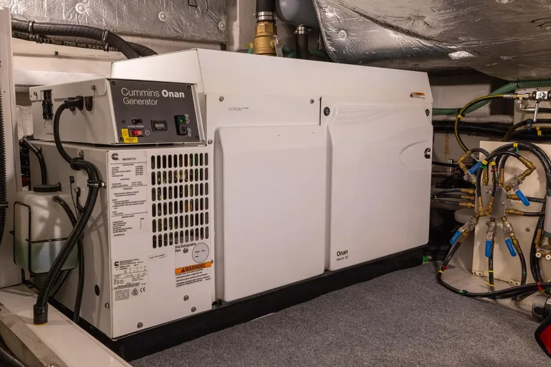 Slide: The Image of Cummins Onan generator in 2020 Sunseeker Predator 74 yacht engine room. - 30