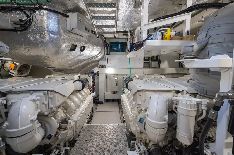 Slide: The Image of Engine room of 2020 Sunseeker Predator 74 yacht, showcasing dual engines and equipment. - 31