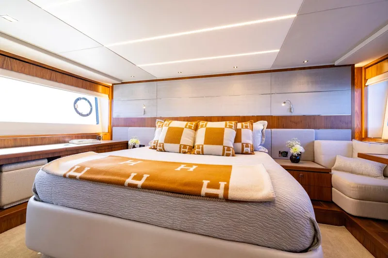 Slide: The Image of Luxurious bedroom interior of 2020 Sunseeker Predator 74 yacht with elegant decor and plush bedding. - 40