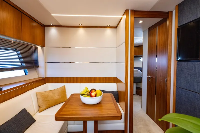 Slide: The Image of Luxurious interior of 2020 Sunseeker Predator 74 yacht with elegant dining area. - 47
