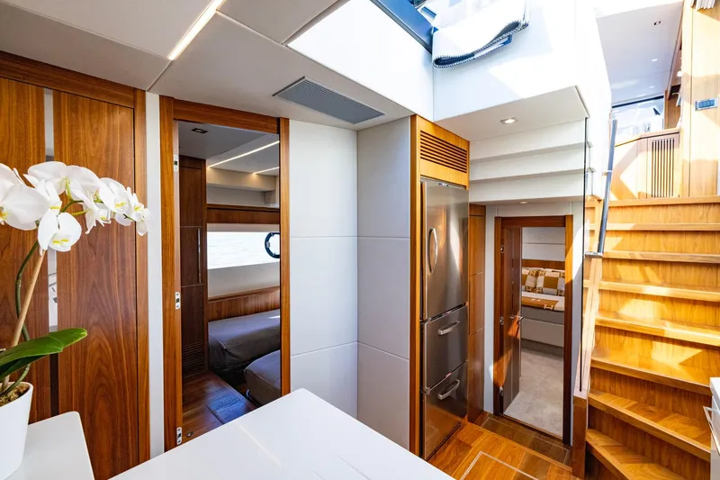 Slide: The Image of Luxurious interior of 2020 Sunseeker Predator 74 yacht with wooden finishes and modern design. - 50