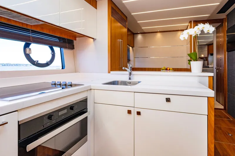 Slide: The Image of Luxurious kitchen interior of 2020 Sunseeker Predator 74 yacht with modern appliances. - 51