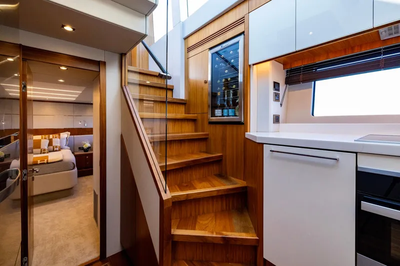 Slide: The Image of Luxurious interior of 2020 Sunseeker Predator 74 yacht with modern kitchen and cozy bedroom. - 54