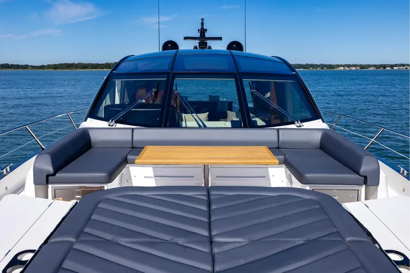 Slide: The Image of Luxurious 2020 Sunseeker Predator 74 yacht with sleek seating and ocean view. - 69