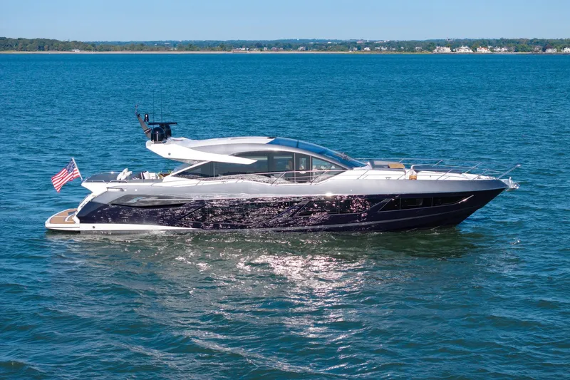 Slide: The Image of 2020 Sunseeker Predator 74 yacht cruising on open water. - 9
