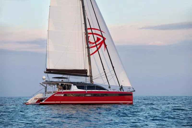 Slide: The Image of Red Privilege Signature 510 yacht sailing on calm waters, 2025 model. - 6