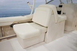 Slide: The Image of 2026 Grady-White Freedom 235 boat interior with comfortable seating. - 4