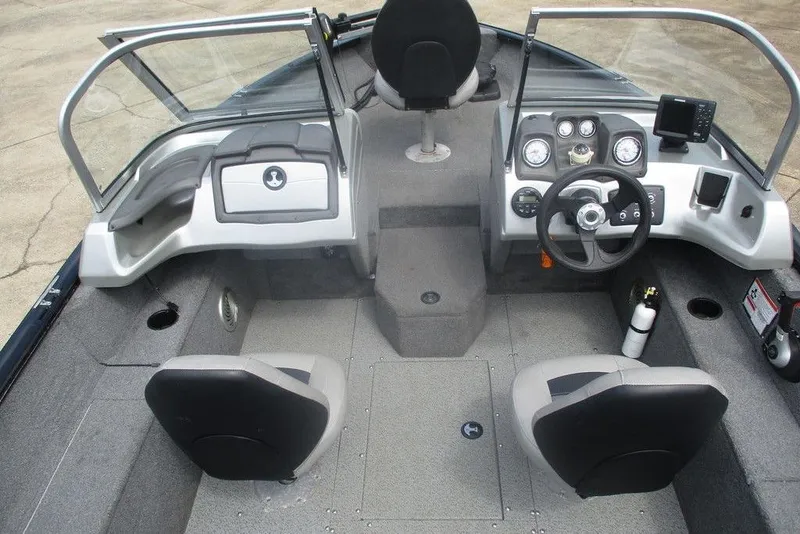 Slide: The Image of 2018 Tracker Pro Guide V-175 Combo boat interior with steering console and seating. - 6