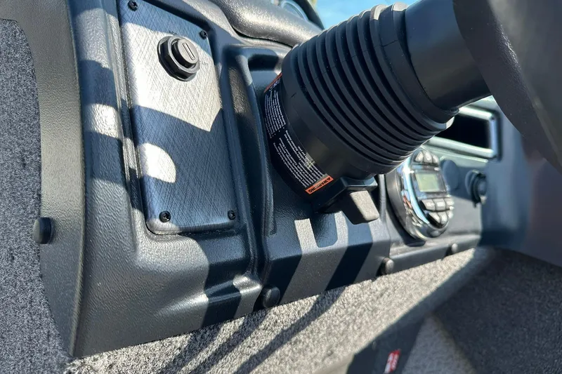 Slide: The Image of Dashboard of 2026 Lund 1875 Fisherman boat with steering details. - 27
