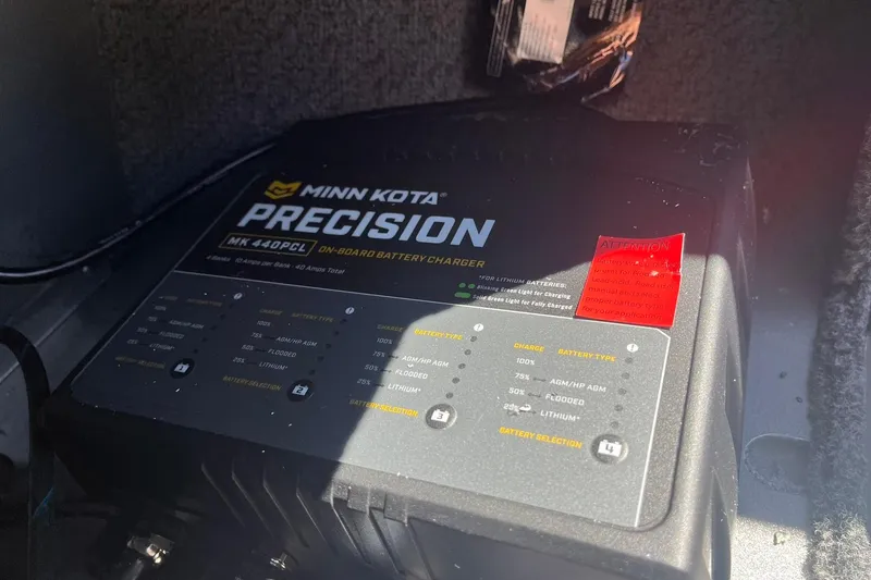 Slide: The Image of Minn Kota Precision MK 440PC onboard battery charger in 2026 Lund 1875 Fisherman boat. - 39