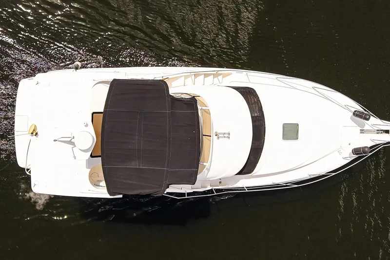 Slide: The Image of Overhead view of 2002 Silverton 352 Motor Yacht on water. - 5