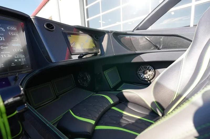 Slide: The Image of Interior of 2025 MTI 440X with advanced dashboard and sleek seating design. - 11