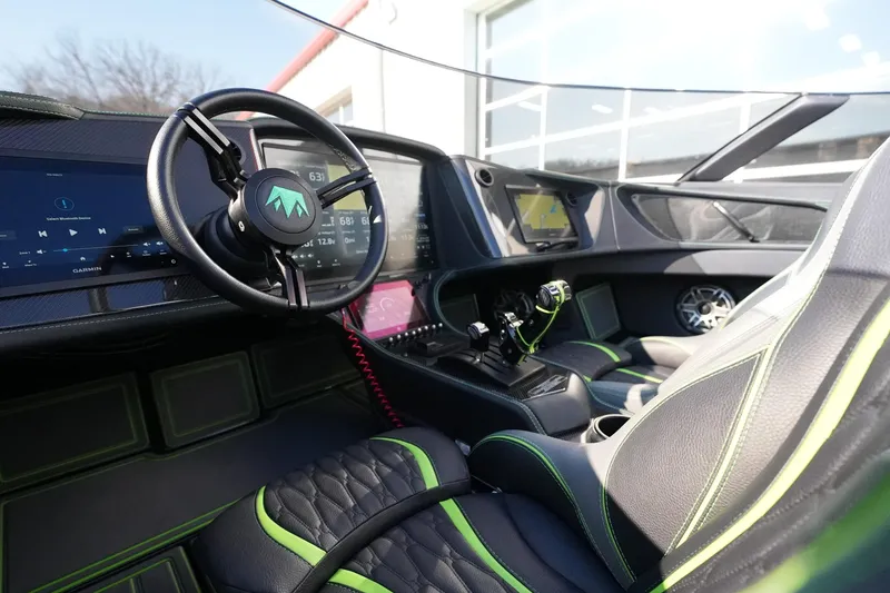 Slide: The Image of Interior of 2025 MTI 440X with advanced dashboard and sleek design. - 30