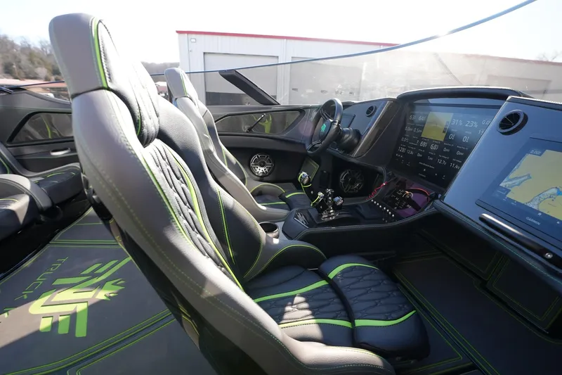 Slide: The Image of Interior of 2025 MTI 440X with advanced dashboard and sleek seating design. - 35
