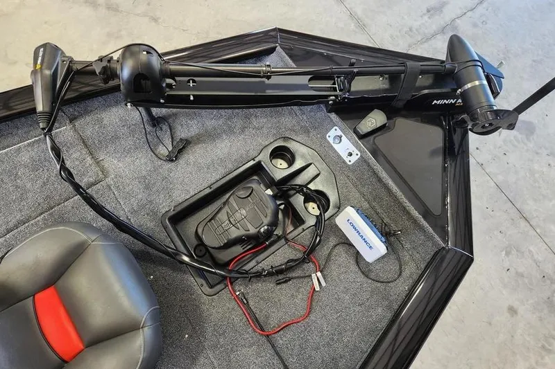 Slide: The Image of 2026 Tracker Pro Team 175 boat interior with Minn Kota trolling motor and Lowrance electronics. - 10