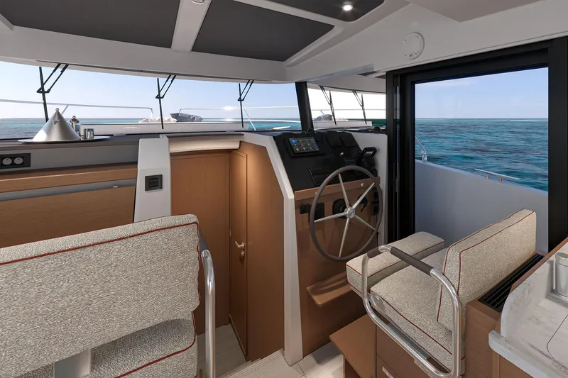 Slide: The Image of 2026 Beneteau Swift Trawler 37 FLY interior with helm, ocean view, and modern design. - 11
