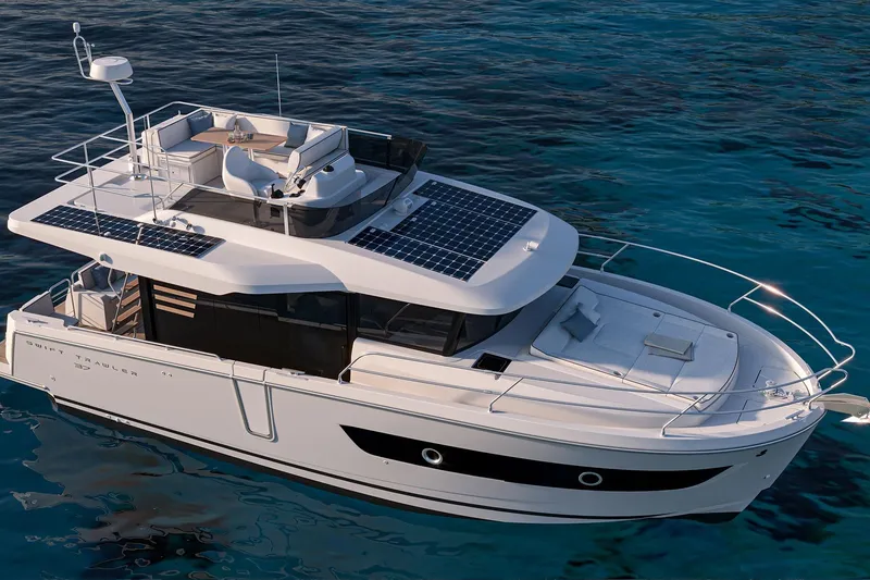Slide: The Image of 2026 Beneteau Swift Trawler 37 FLY on serene blue water, showcasing modern design. - 4