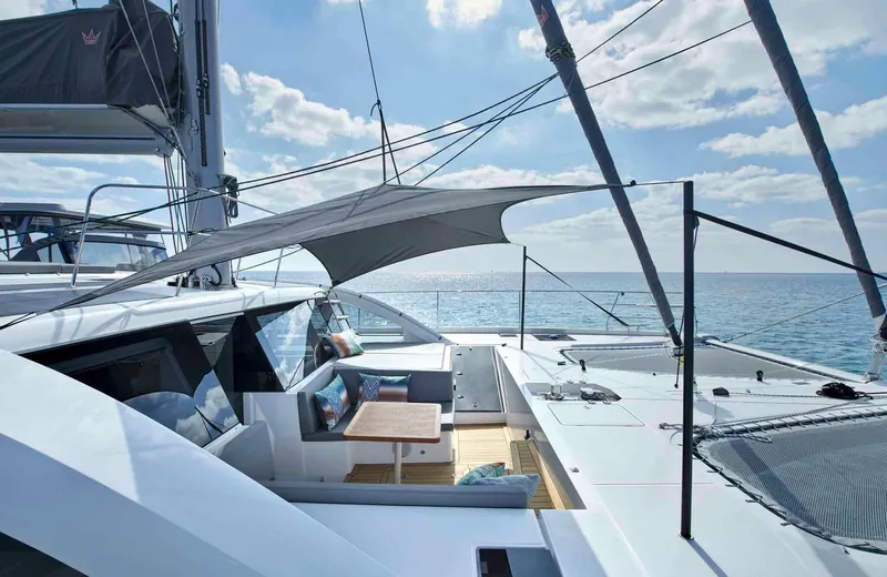 Slide: The Image of Luxury Privilege Signature 580 yacht, 2025 model, with elegant deck and ocean view. - 12