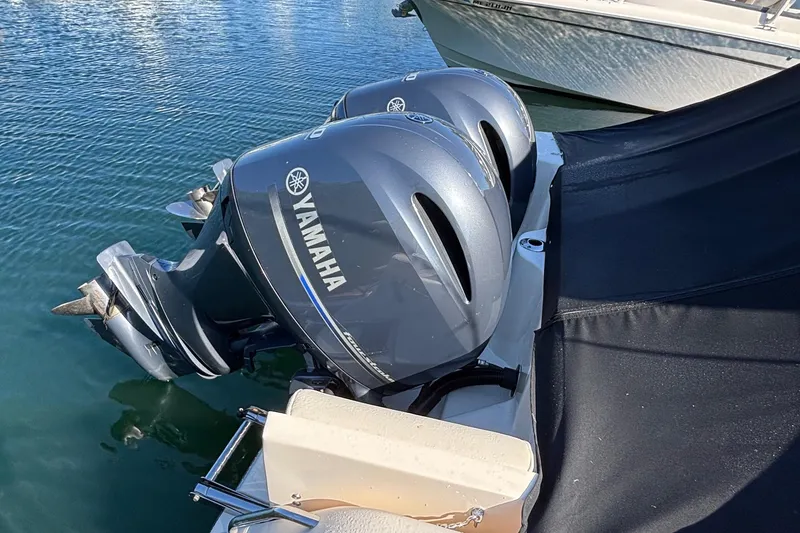 Slide: The Image of Twin Yamaha outboard engines on a 2020 Grady-White Freedom 275 boat. - 7