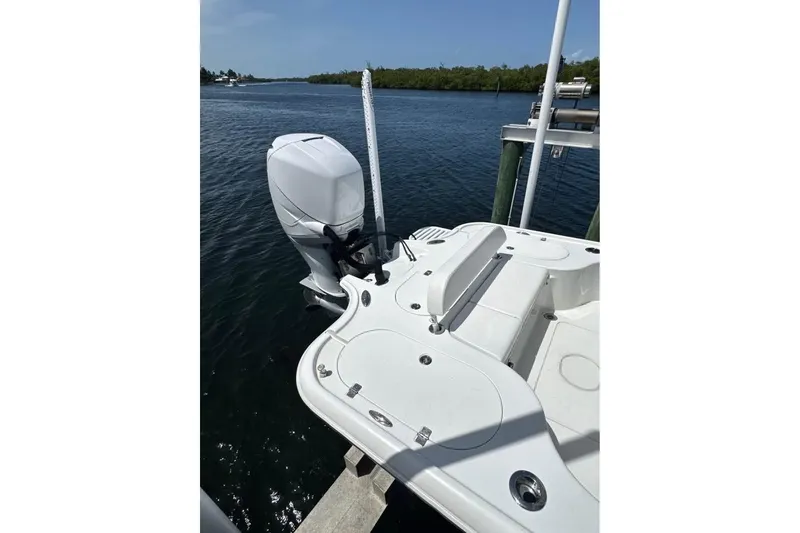 Slide: The Image of 2017 Yellowfin 24 Bay CE boat with outboard motor on calm water. - 10