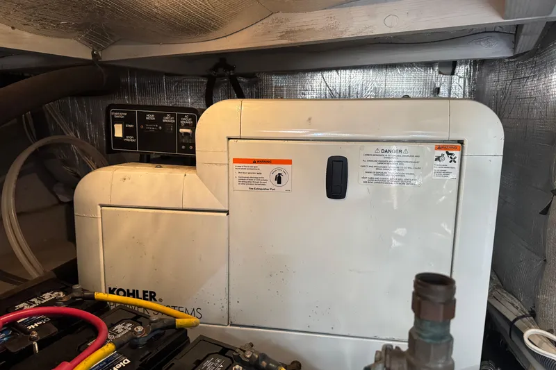 Slide: The Image of Engine room of 2003 Silverton 42 Convertible with Kohler power system. - 27