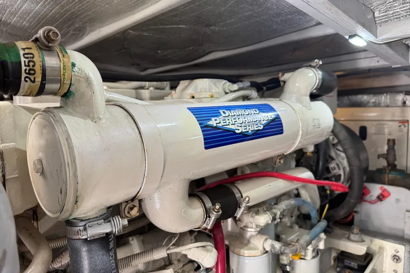 Slide: The Image of Engine room of a 2003 Silverton 42 Convertible with Diamond Performance Series engine. - 28