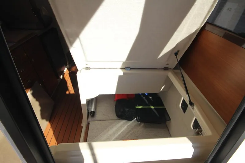 Slide: The Image of 2026 Ranger Tugs R-27 boat with solar panel at indoor exhibition. - 26