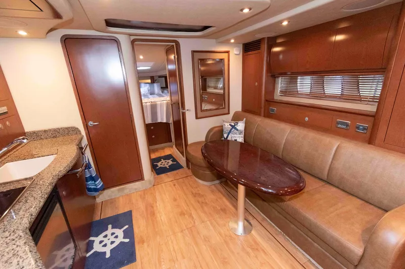 Slide: The Image of Luxurious interior of 2007 Sea Ray 40 Sundancer yacht with elegant wood finishes. - 11