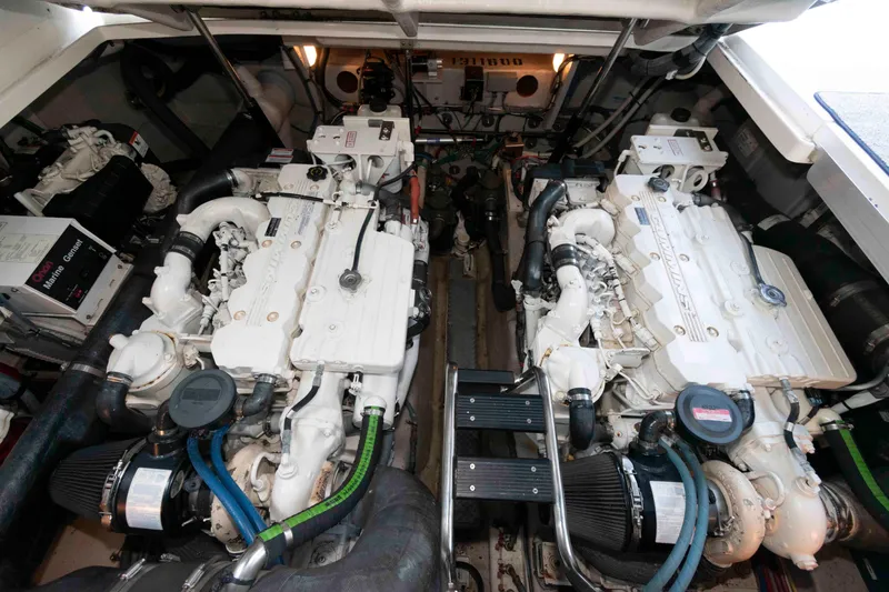 Slide: The Image of Engine room of a 2007 Sea Ray 40 Sundancer with twin marine engines. - 18