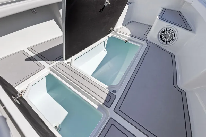 Slide: The Image of 2022 Barker Boatworks 26 Open deck with storage compartments and speaker. - 12