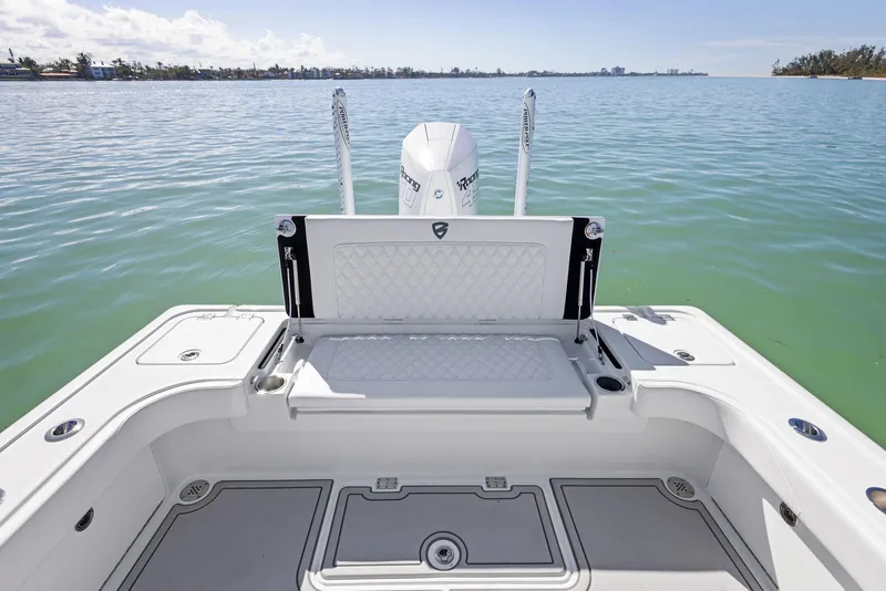 Slide: The Image of 2022 Barker Boatworks 26 Open, rear view on calm water. - 23