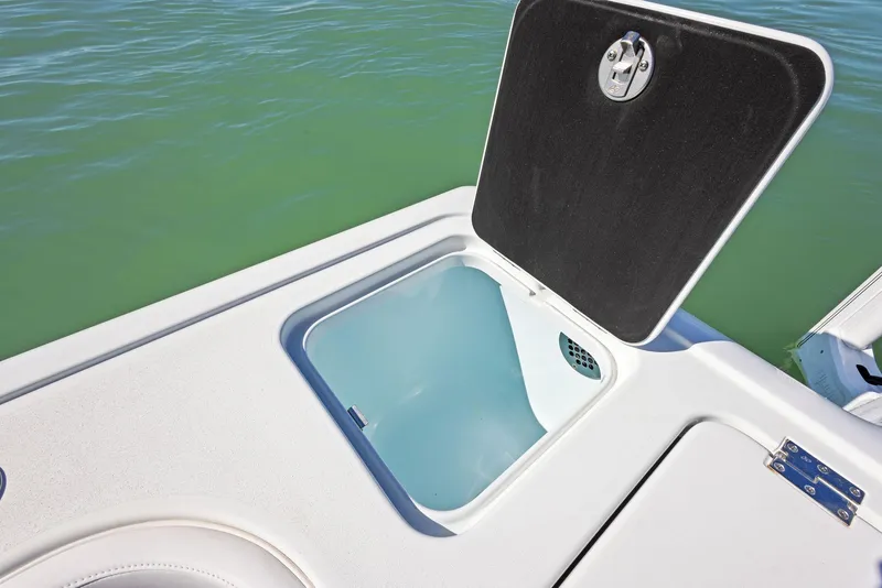 Slide: The Image of 2022 Barker Boatworks 26 Open livewell, open lid, on calm water. - 25