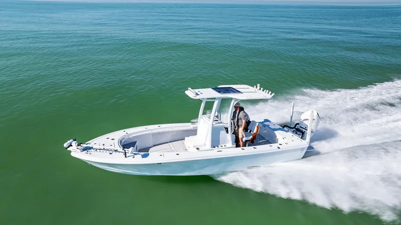 Slide: The Image of 2022 Barker Boatworks 26 Open cruising on open water, showcasing sleek design and performance. - 31