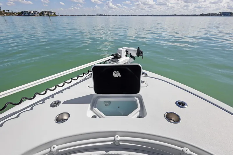 Slide: The Image of 2022 Barker Boatworks 26 Open on calm water, showcasing deck features. - 9