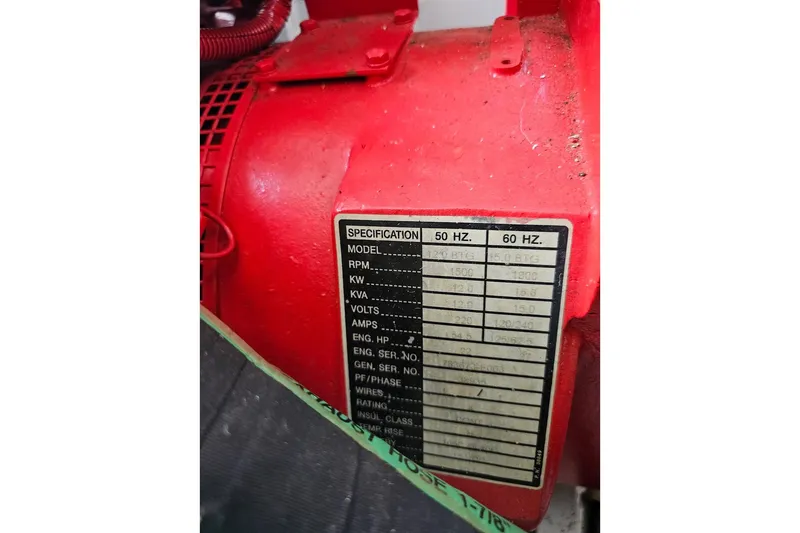 Slide: The Image of Red engine with specification label, Sumerset 16x75, 2000 model. - 51