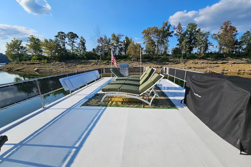 Slide: The Image of Rooftop deck of 2000 Sumerset 16x75 houseboat with lounge chairs and scenic lake view. - 62