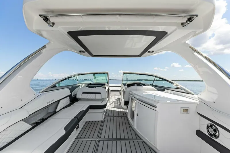Slide: The Image of Luxurious interior of 2022 Regal 33 OBX boat with sleek seating and modern design. - 33