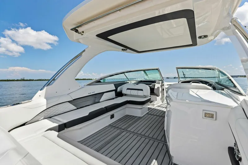 Slide: The Image of Luxurious 2022 Regal 33 OBX boat interior with spacious seating and sleek design. - 35
