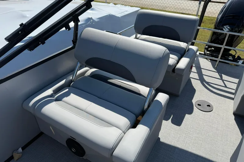 Slide: The Image of 2025 Bentley Pontoons Legacy 243 QSB with luxurious gray seating on deck. - 15
