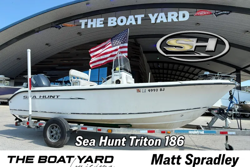 The Image of 2004 Sea Hunt Triton 186 boat on trailer at The Boat Yard dealership. - 1