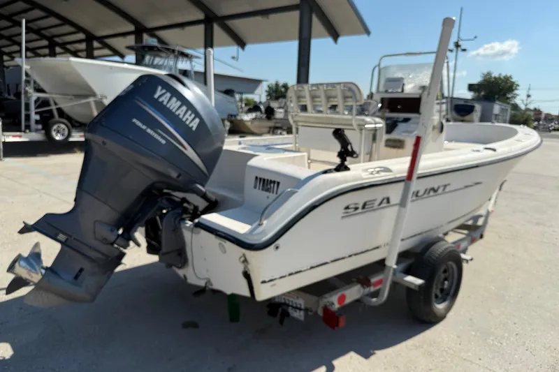Slide: The Image of 2004 Sea Hunt Triton 186 boat with Yamaha outboard motor on trailer. - 7
