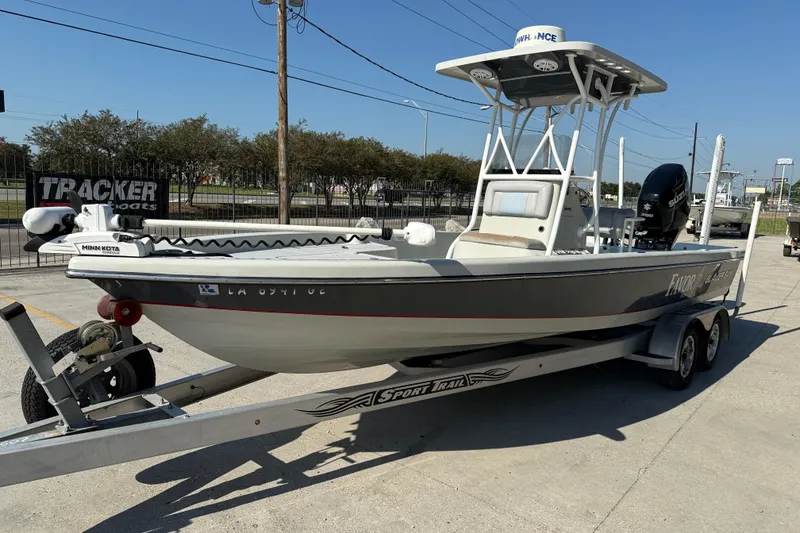 Slide: The Image of 2016 Blazer Bay 2420 Professional boat on trailer, featuring Minn Kota trolling motor. - 4