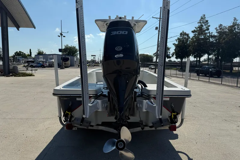 Slide: The Image of 2016 Blazer Bay 2420 Professional boat with powerful 300 engine, rear view. - 6