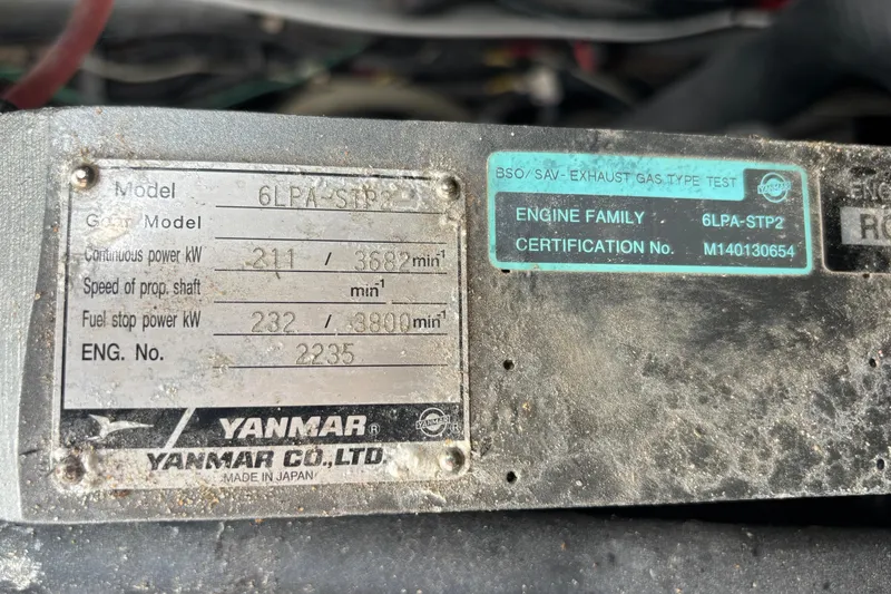 Slide: The Image of Yanmar engine plate on a 2000 Shamrock 260 Express, model 6LPA-STP2, showing specifications. - 30