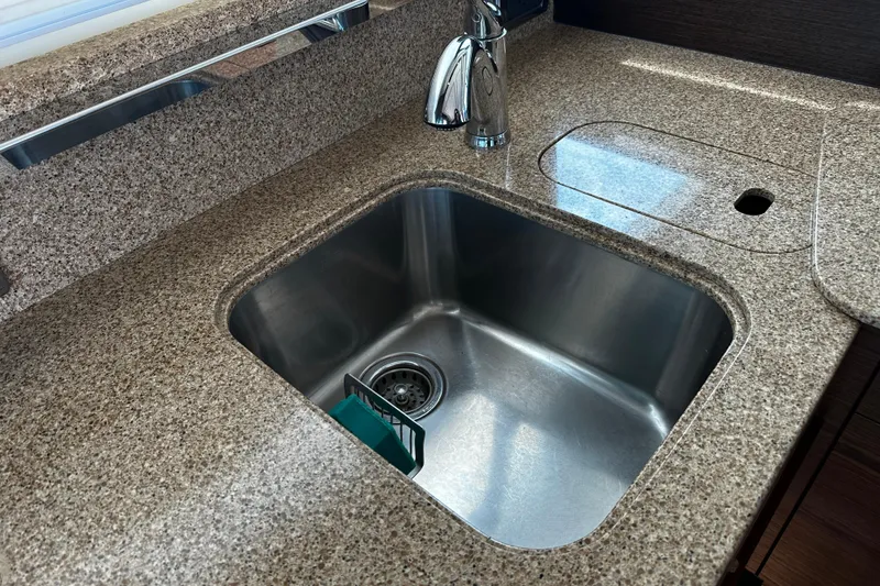 Slide: The Image of Granite countertop with stainless steel sink in 2014 Tiara 5000 Coupe. - 17