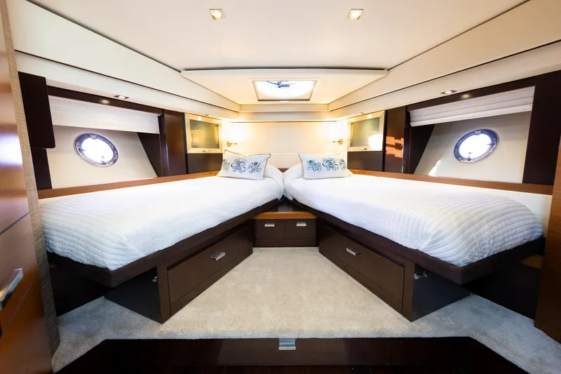 Slide: The Image of Luxurious 2014 Tiara 5000 Coupe yacht interior with twin beds and elegant design. - 31