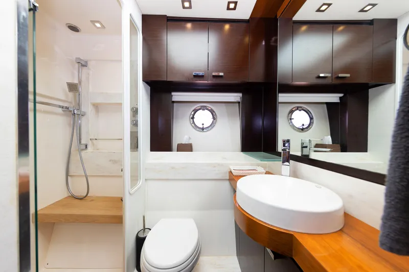 Slide: The Image of Luxurious bathroom interior of 2014 Tiara 5000 Coupe yacht with modern fixtures. - 38