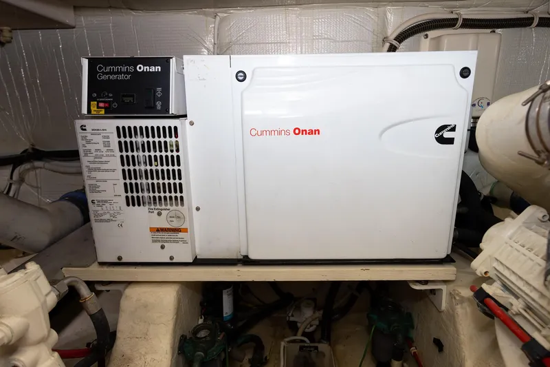 Slide: The Image of Cummins Onan generator in 2014 Tiara 5000 Coupe engine room. - 42