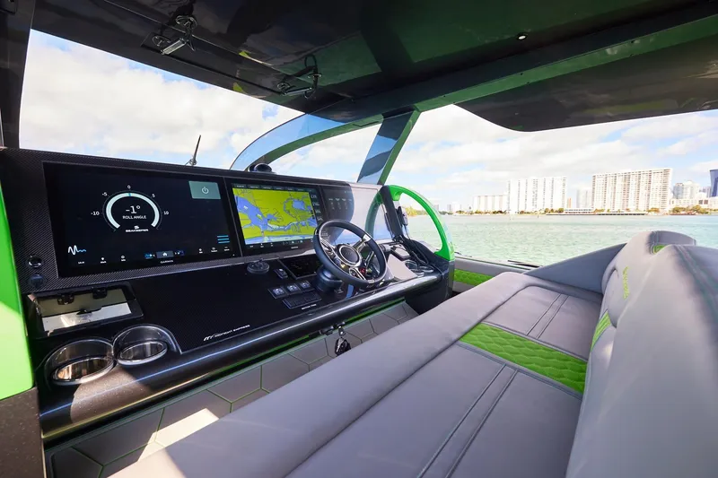 Slide: The Image of Luxurious cockpit of Midnight Express 52' Vitesse boat with advanced navigation displays. - 13